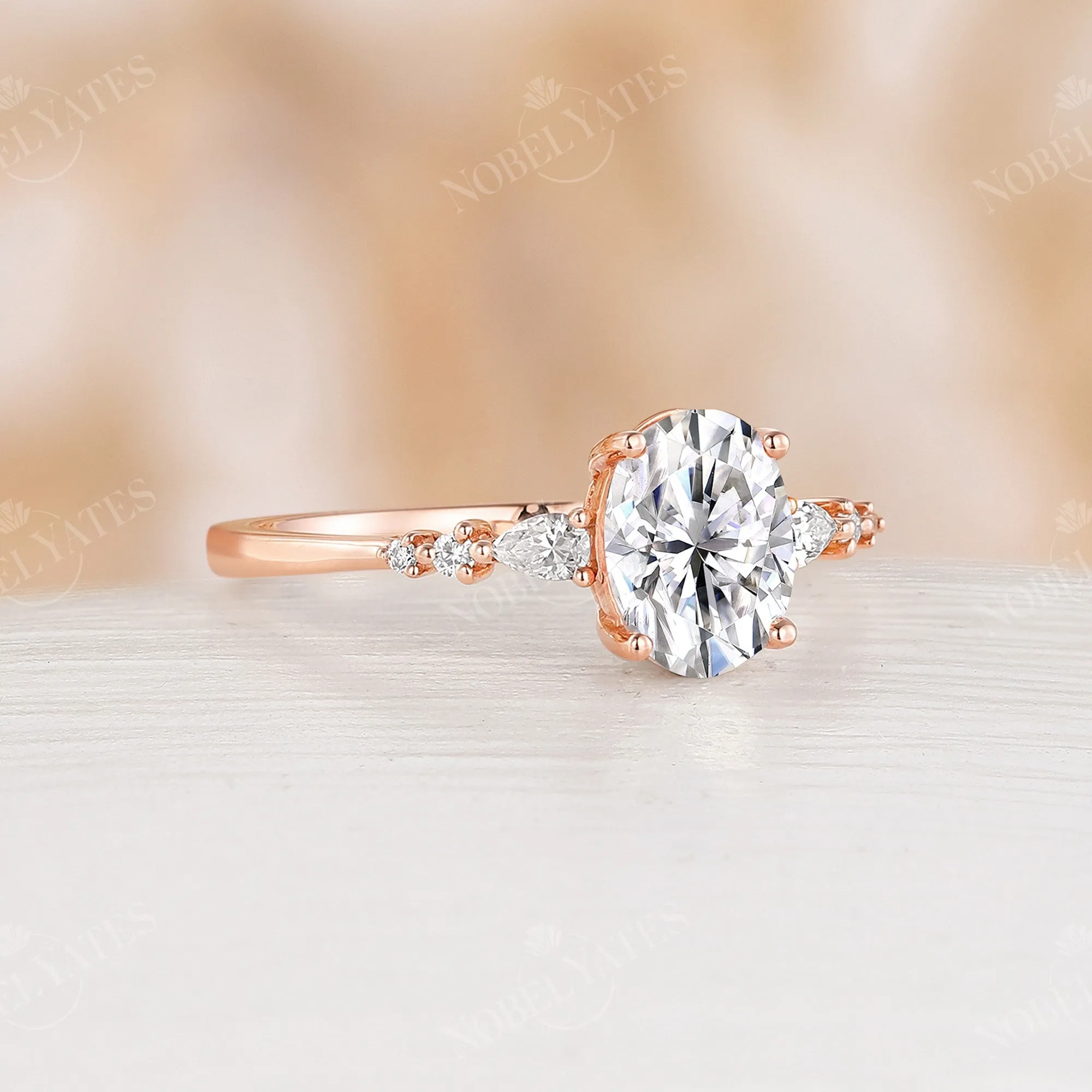 Moissanite Prong Set Engagement Ring Side Stone Rose Gold